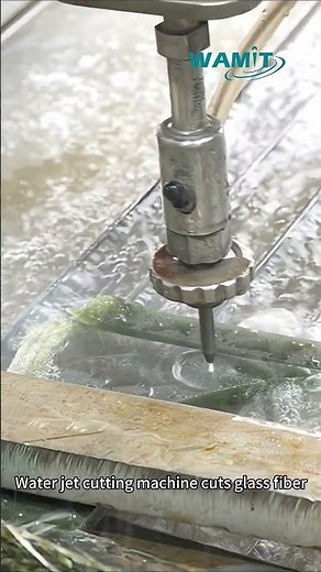 Water jet cutting machine cuts glass fiber