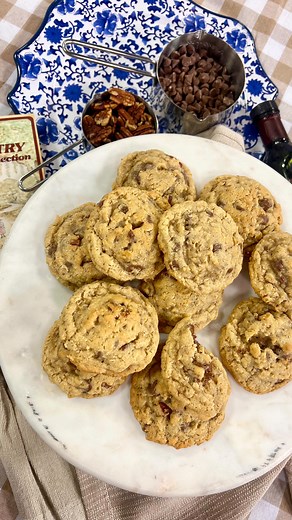 Give your classic chocolate chip cookie an upgrade! These Cowboy Cookies make a festive and delicious Pioneer Day treat. Here’s the recipe… Cowboy Cookies Recipe from Elizabeth Harmer INGREDIENTS * 1 cup butter * 1 cup brown sugar * 1 cup white sugar * 2 eggs * 1 teaspoon vanilla * 2 1/4 cups flour * 1 tsp. baking soda * 1/2 tsp. salt * 1/2 tsp. baking powder * 2 cups rolled oats * 1 1/2 cups milk chocolate chips * 1/2 cup chopped pecans METHOD 1. Preheat oven to 400. 2. Cream sugars, butter, eg