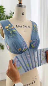 3M views · 45K reactions | Making a corset V neck floral embroidery steel blue midi dress. #sewing #fashion #bluedress #elegant #fashionblogger #fashiondesigner #elegantstyle #dress #gown #wedding #weddingguestdress #bridaldress #sewing #creative #creativedesign #hautecouture #fashion #FashionWeek | Miss Jophiel | Facebook