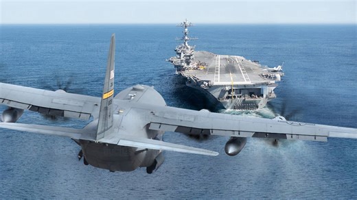 The US lands largest plane on aircraft carrier at sea