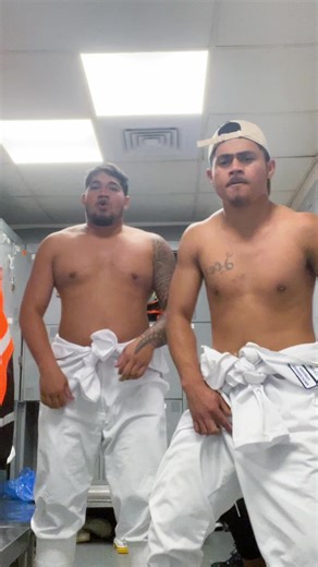 Synchronized Dance Routine in Locker Room Setting