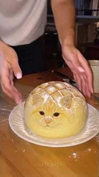 Shaping dough into tiny cats 😻