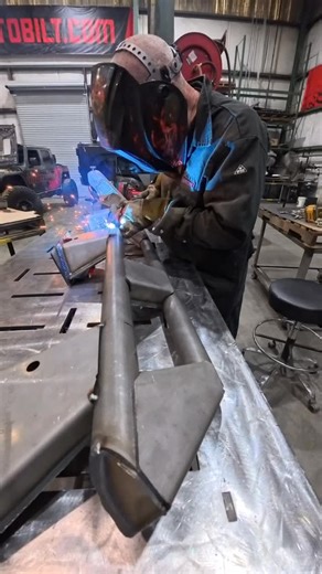 Bender’s at it again—laying down some MIG welds on our prototype frame-mounted rocker guards. Strength, style, and protection all start right here at the weld table. The new frame connectors are designed to deliver serious durability—offering 60% more weld surface to the frame and 40% more weld surface to the tube compared to a traditional tube-to-tube connection. That extra contact means extra strength where it matters most. #Motobilt #WeldPorn #FabricationLife #JeepJK #RockSlider #FrameMounted