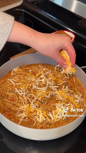 Taco Spaghetti The perfect Taco Tuesday twist! It’s cheesy, creamy, and packed with flavor. This one skillet taco spaghetti comes together quick and is always a crowd favorite! Ingredients 1 pound ground beef ½ pound spaghetti noodles ½ large onion, diced 1 packet taco seasoning (28g) 1 (10 oz) can Rotel, undrained (use mild Rotel for less spice) 12 ounces evaporated milk 3 cups shredded Monterey Jack cheese (or any cheddar blend you like) Directions 1. Cook the spaghetti according to package di