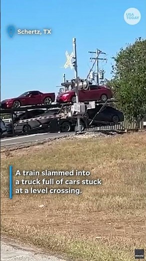 Train plows through truck stuck on crossing