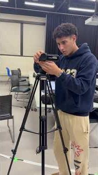 How to attach and operate a camcorder on a consumer tripod.