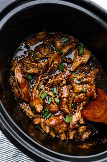 Recipe here: https://therecipecritic.com/crockpot-bourbon-chicken/ Tender and juicy chicken thighs simmered in a brown sugar bourbon sauce all day long. Your family will love this melt-in-your-mouth crockpot bourbon chicken. | The Recipe Critic
