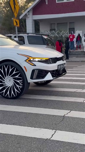 White Kia on 28’s Pulling Thru