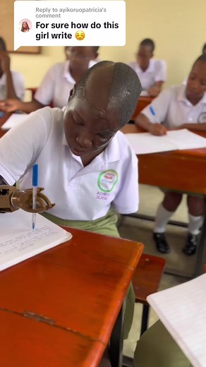 Beautiful Handwriting Using an Artificial Hand | Vision for Africa High School