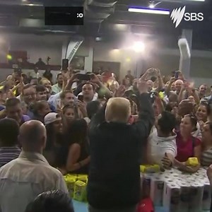 Nothing but net: Donald J. Trump threw paper towels like basketballs to Puerto Rican residents in a disaster relief centre. Full story: http://bit.ly/2ynRIvE | SBS News