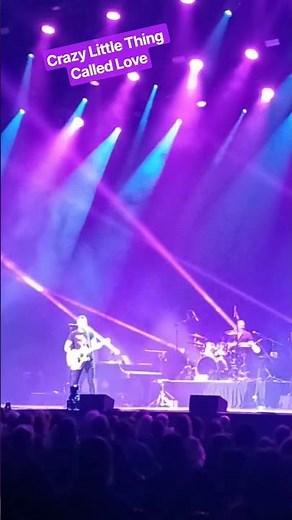 "Crazy Little Thing Called Love" performed by One Vision of Queen