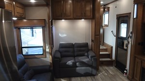 With tons of open space and endless storage, the MX450 toy hauler really is the definition of a Fullhouse. Watch the video to see the entire MX450 layout, including the incredible 13-foot garage space. | DRV Luxury Suites