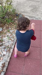 Mini melt down Alert!!!! She gets so mad when her purse gets “Stuck” on her arm! Lol. She loves all her mini purses!!! 👛 👜 #MaterialGirl #babyonthego | Elaine Rodriguez