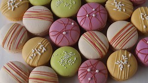 Hello friends! Today we are making these beautiful colorful macarons, decorated with melted chocolate and sprinkles. They are filled with a cream cheese frosting and apricot preserves, and I will also show you how to make all the different colors from one batch of macarons. https://www.piesandtacos.com/colorful-macarons/ | Pies and Tacos