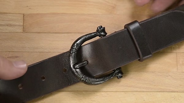 He forged a handmade belt buckle and leather belt worth hundreds in stores
