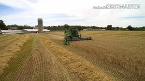 2016 wheat harvest with the John Deere 9550, the farmer and farmer's wife work together -- The Farming Life