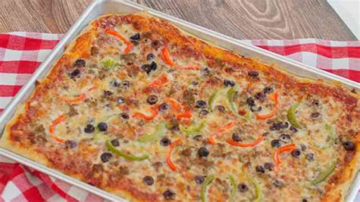 Crispy bakery-style sheet pan pizza you can make in one pan in just 35 minutes