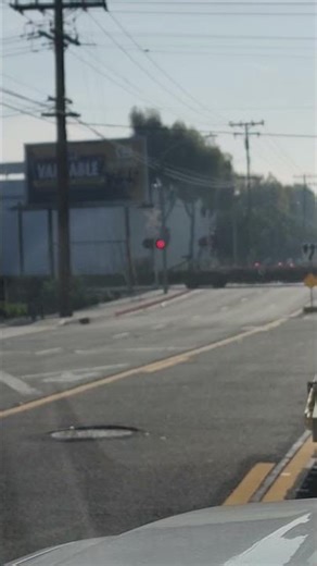Intermodal train crawling past a crossing #train #railroad