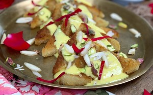 184K views · 91 shares | Shahi tukda also known as double ka meetha in Hyderabad is a delicious dessert made with toasted bread in ghee dipped in a sugar syrup and topped with creamy rich rabri. It makes a great dessert for parties and is usually made during iftar. Do give this declious dessert a try and tell how you loved it! #IftarRecipes Recipe Link - https://www.archanaskitchen.com/quick-and-easy-shahi-tukda-recipe-spiced-indian-bread-pudding | Archana's Kitchen | Facebook