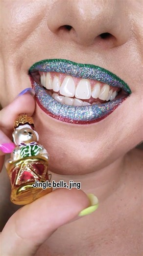 Lip art Creative makeup on Instagram: "Jingle lips! ✨ A dazzling Christmas lip art with a blinding holo pigment from Kaima cosmetics (code 'themirrorbeauty') — not gritty at all, but shifts through all the colours of the rainbow! 🪩 Just like holiday makeup should, am I right? 😉 💚❤️✨ The holo lips tutorial is on my YT channel! 💄 💚 ❤️ ✨ #glitterlips #holomakeup #xmasmakeup"