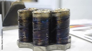 3d printed metal model close-up. Model printed on a 3D printer made of metal. Three-dimensional metal object created by a 3d printer from metal. 3D printing additive modeling manufacturing technology