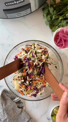 Cilantro Lime Slaw ⭐ https://therealfooddietitians.com/cilantro-lime-slaw/ Sweet, spicy, crunchy, and quick to make, this cilantro lime slaw recipe makes for an excellent side dish or topping to pair to add flavor and texture to a variety of recipes like pulled pork bowls. | The Real Food Dietitians