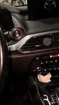 How to set the parking brake pads to service mode on a 2022 Mazda CX-9