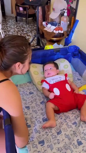 Baby Playing on Changing Mat with Cute Dog Pattern