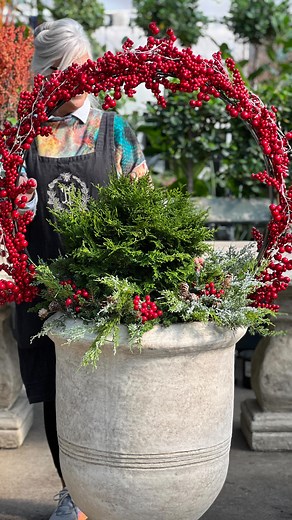 Our hand forged, 30 inch, steel, Topiary rings, are versatile for every season! We have two strands of our all weather berry garland and twinkle lights for our holiday planters. Let me know if you have any questions, I’ll be happy to help you if we can! #topiarygarden #redberries #christmasdecorating | Millstone Market & Nursery