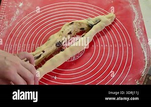 Production of dough products. The process of rolling out the dough on the dough rolling machine