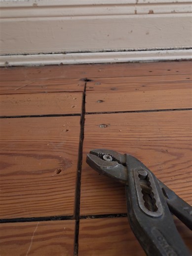Removing Stuck Screws from Old Wood Flooring
