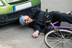 Cyclist Hit By A Car Pulling Out Of A Drive - Who Can Claim?