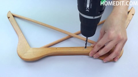 Bed table from wooden hangers