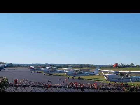 Robinson R44 Raven II & Cirrus SR20 at Princeton Airport (39N)
