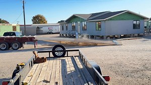Builders FirstSource delivering trusses for another new custom home! We did re stack them after the bands busted! | Hindman Ready Built Homes, Inc