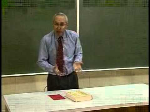 Gravitational Acceleration: A Book and a Piece of Paper Fall