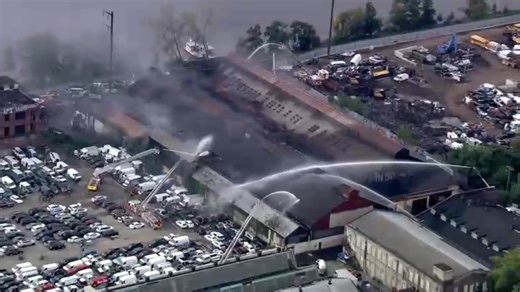 Firefighters battle massive warehouse fire in Philadelphia