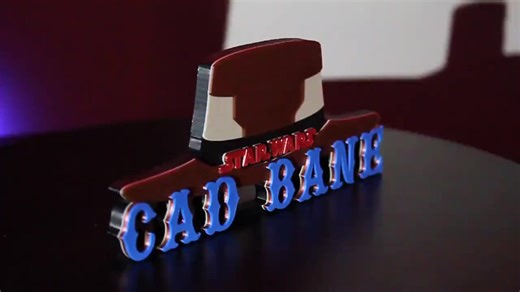 Channel the cool menace of one of the galaxy’s most feared bounty hunters with this sleek 3D-printed Cad Bane logo, perfect for Star Wars collectors looking to give their display a sharp edge. Key Features: ✔ Bold 3D Lettering – Inspired by Cad Bane’s signature style and cold precision ✔ Display-Ready Build – Freestanding or wall-mountable to fit seamlessly into your setup ✔ Optional Magnetic Mounting – Add magnets to attach it to a fridge, Displate, or any metal surface ✔ Custom Colors & Sizes 