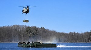 US Army Helicopters Lift Cargo and Soldiers Cross River