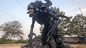 200 Junked Tires Transformed Into an Awesome Alien Xenomorph Sculpture — GeekTyrant