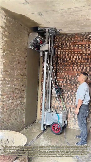 Auto Plaster Application: Builder Feeds Mortar Into Automated Wall Rendering Machine