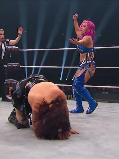 Mina Shirakawa with a brutal kick to the head of Charli Evans!