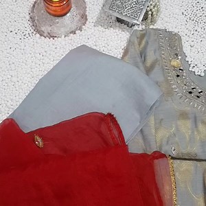 Grey mirror embroided neck stitched price 2200 Unstitched 2000 For...