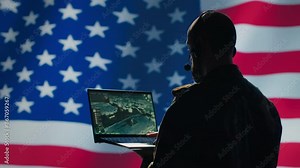 US Air Force dispatcher looking at surveillance transmission on device, relaying data to ground soldiers from control room using headset, isolated over United States flag background, camera A