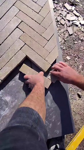 Curving Herringbone Patio: A Challenging But Rewarding Landscaping Project