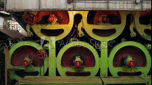 Old Manufactoring equipment Produce Paper Machine Shafts At Paper Mill. equipment. Paper Production. rolling rolls