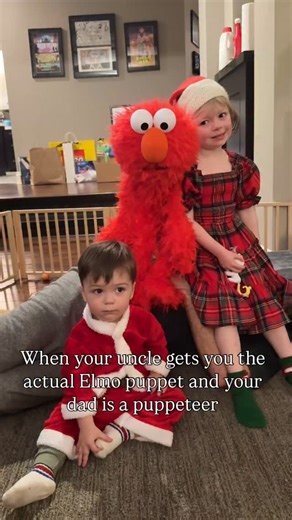Ryder Birdie on Instagram: "When your uncle gets you the actual Elmo puppet and your dad is a puppeteer"