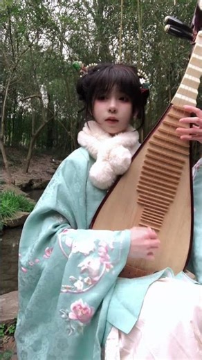 When it comes to playing the zither it s like playing high mountains and flowing