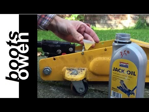 Filling a trolley jack with oil
