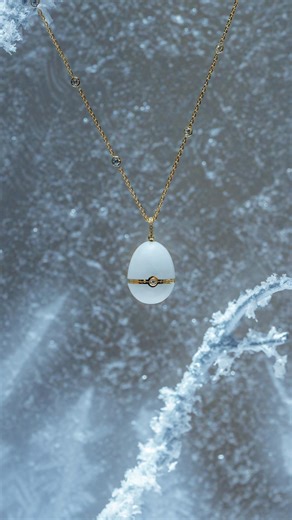 Honouring the first Imperial Egg of 1885, this Fabergé N°1 surprise pendant embodies serene purity and modern elegance. Be one of the first to purchase yours. | Fabergé
